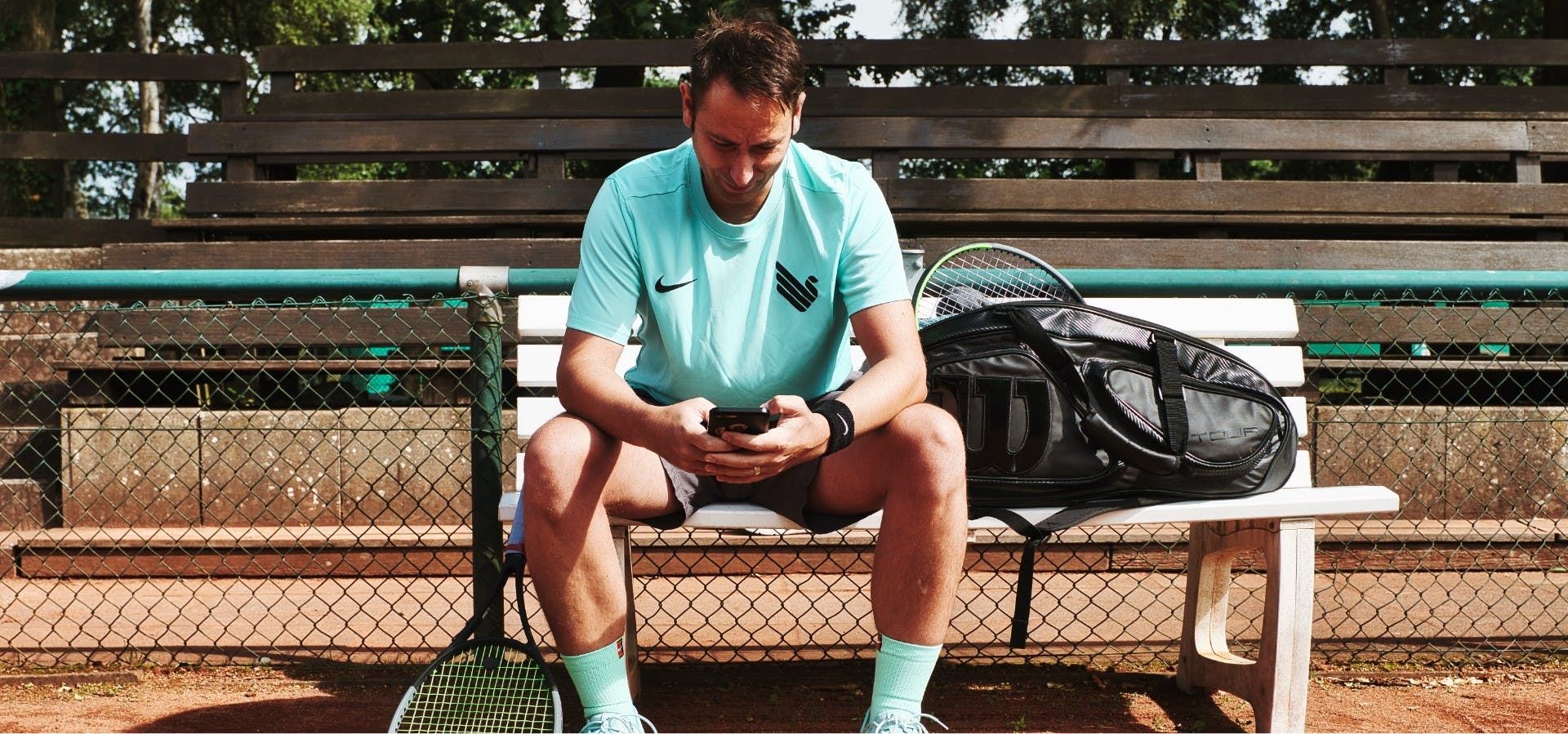 Tennis player with iPhone
